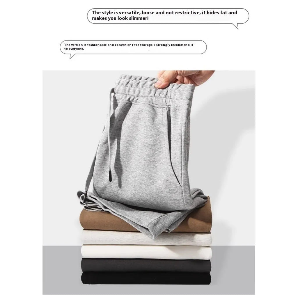 Cotton straight-leg summer shorts in light grey shown on a hanger