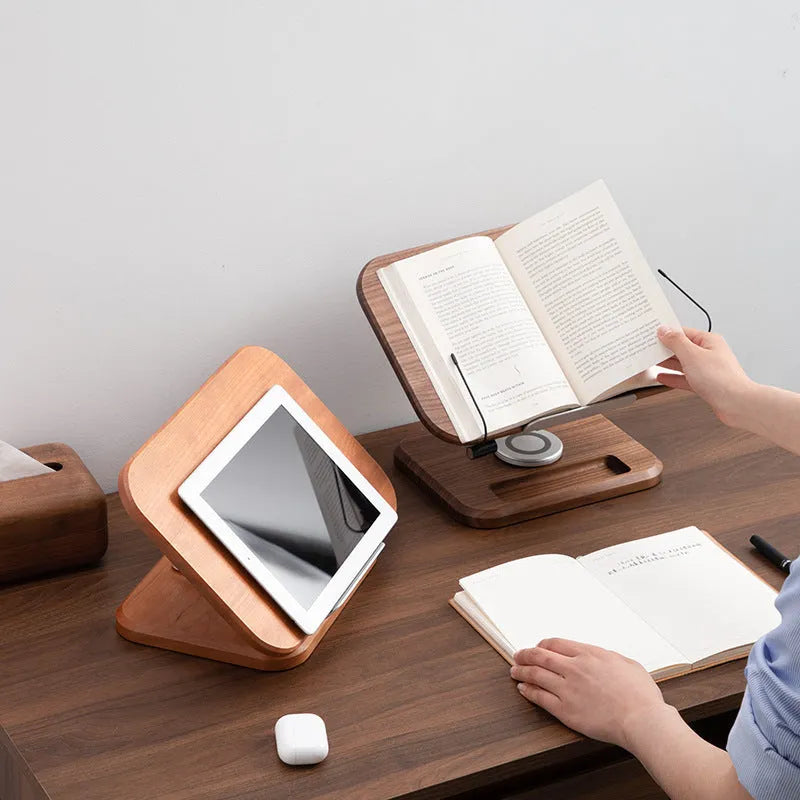 Walnut-coloured solid wood adjustable reading rack holding a book.