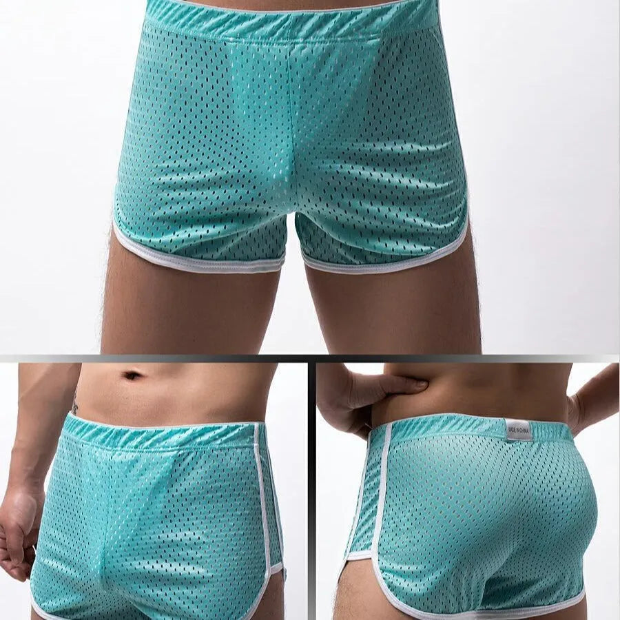 Men's three-point boxers in black, gray, and blue showing breathable knitted cotton nylon fabric and mid-waist fit.