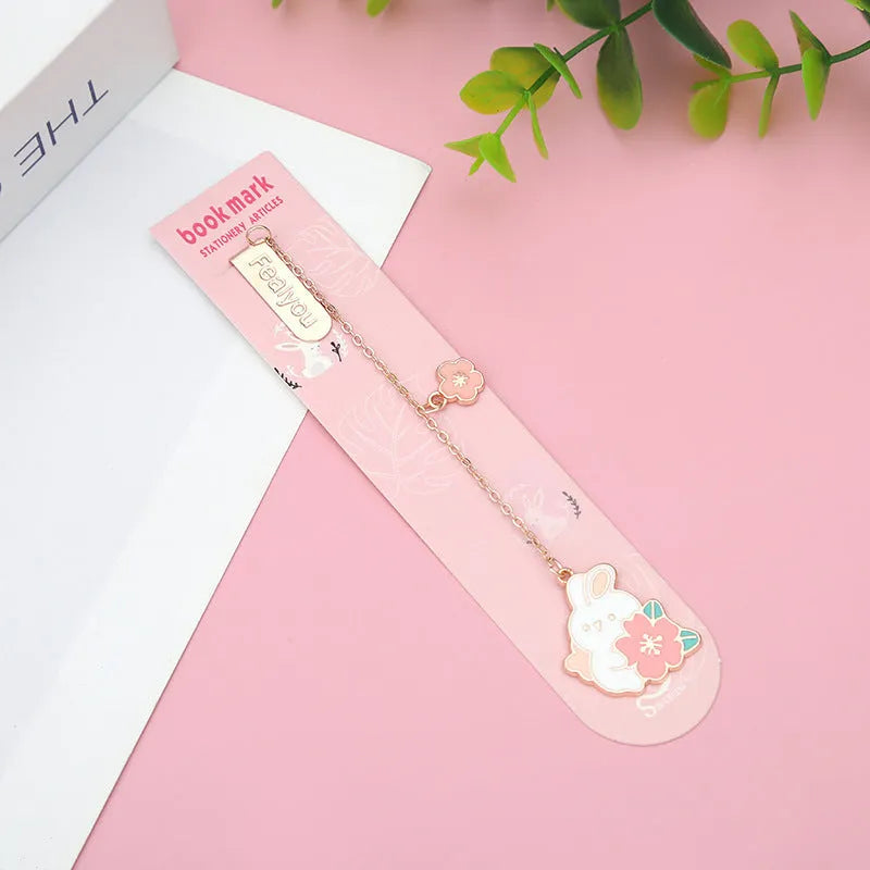 Creative cartoon metal pendant bookmark featuring cherry blossom cat and rabbit designs.