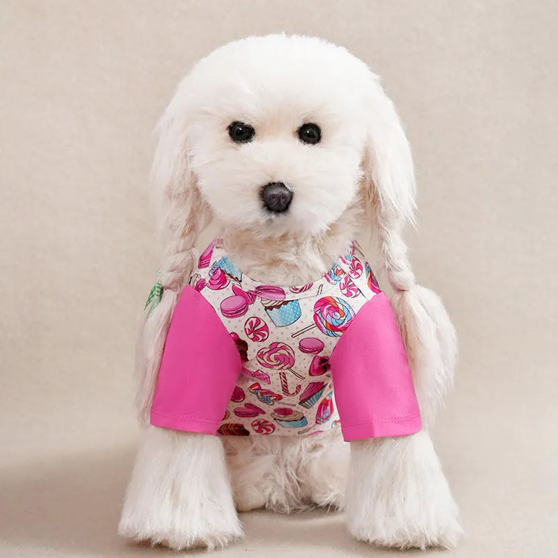 Printed polyester t-shirt for a small dog on a white background, showing colour and design.