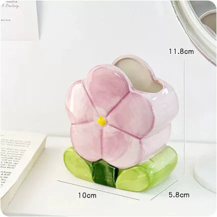 Ceramic flower pattern pen holder storage box on desk showing blue floral design