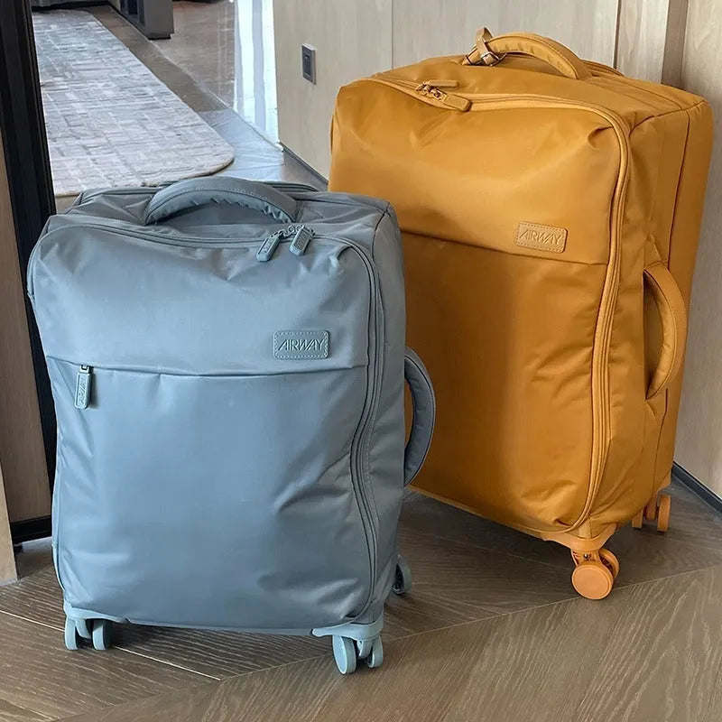Ultra-light waterproof Oxford cloth suitcase with universal wheels in contemporary colour options