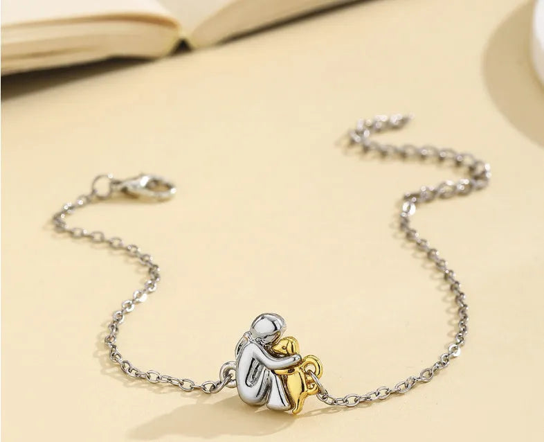 Woven angel motif couple bracelet in black with electroplated flexible wire finish
