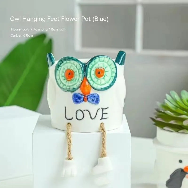 Ceramic hanging foot flowerpot in a cartoon style for desktop succulents.