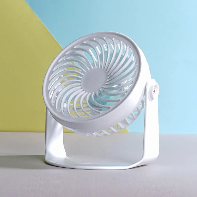 Compact USB desk fan with clip attachment and three blades for quiet personal cooling