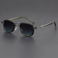 Retro style square sunglasses with a mixed metal and plastic frame and AC lenses.