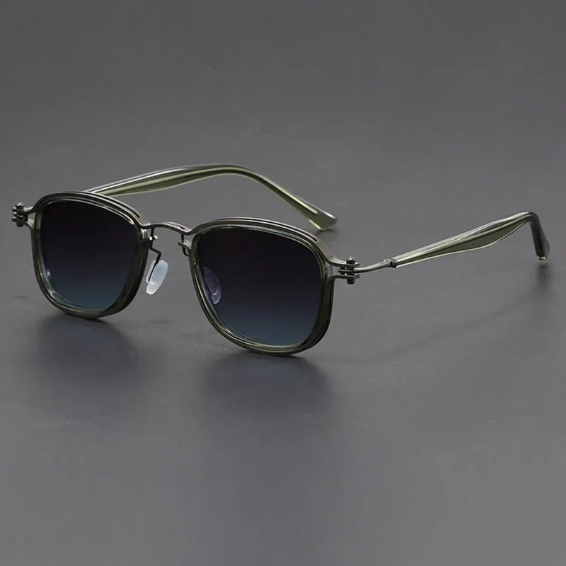 Retro style square sunglasses with a mixed metal and plastic frame and AC lenses.
