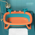 Light blue foldable portable pet tub for washing a small dog or cat