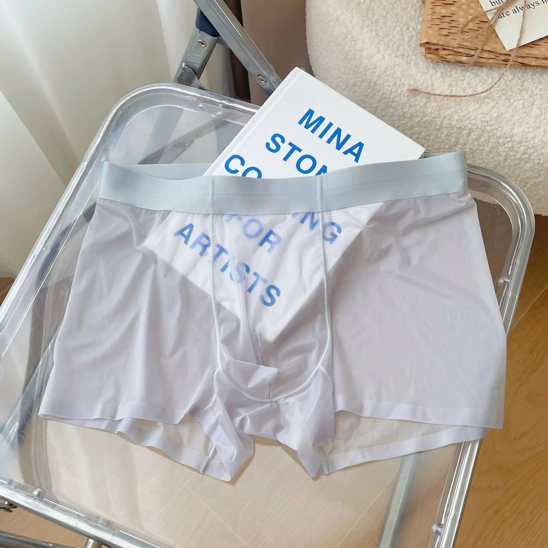 Thin breathable men's boxer shorts in seamless quick-drying nylon fabric showing mid waist design
