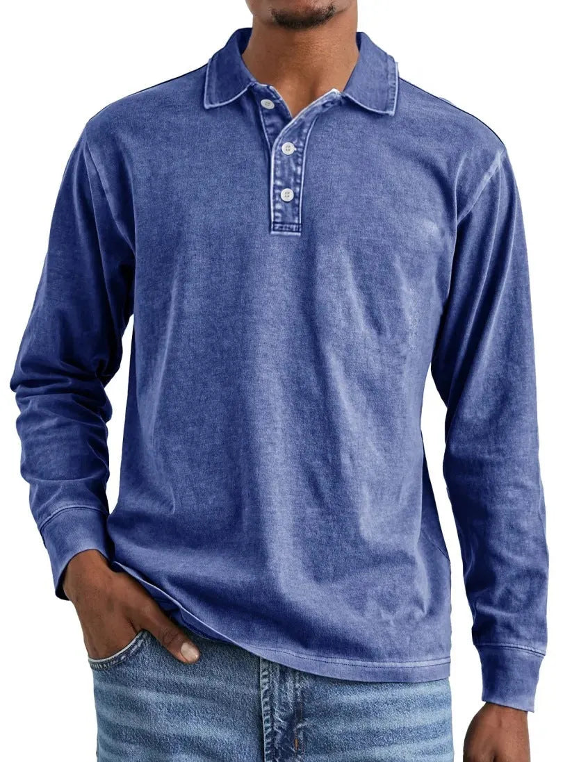 Man wearing a retro washed distressed cotton lapel long sleeve polo shirt in army green.