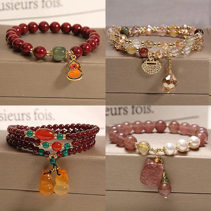 Women's multi-layer crystal bracelet with natural garnet, strawberry quartz, and moonstone pendants in Korean style.
