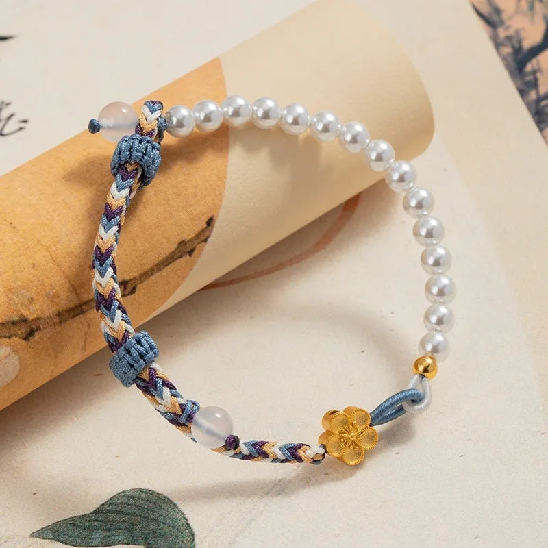 Peach coloured Chinese flower weaving carrying strap with sterling silver chalcedony and pearl decorations