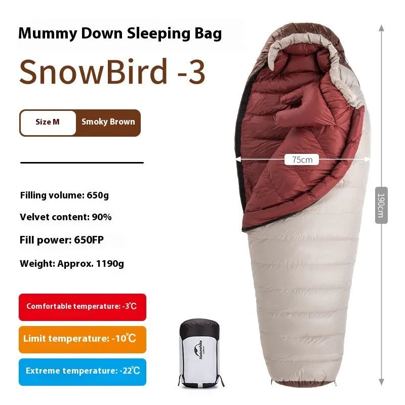 Goose down mummy style sleeping bag for adults with a storage bag.
