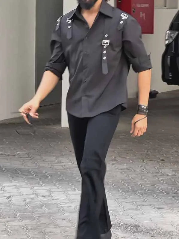 Black men's utility style button-up shirt with regular fit on a mannequin.