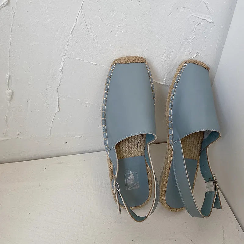 Women's retro-style flat sandals in canvas with an animal pattern, shown in multiple colours.