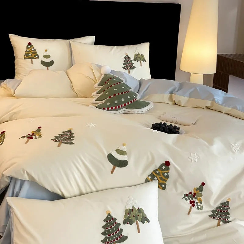Pure cotton four-piece bedding set with embroidered Christmas tree pattern showing duvet cover, bed sheet and pillowcases