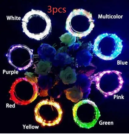Copper wire LED string light with 20 bulbs and a white plastic bottle stopper for decoration.