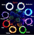 Copper wire LED string light with 20 bulbs and a white plastic bottle stopper for decoration.