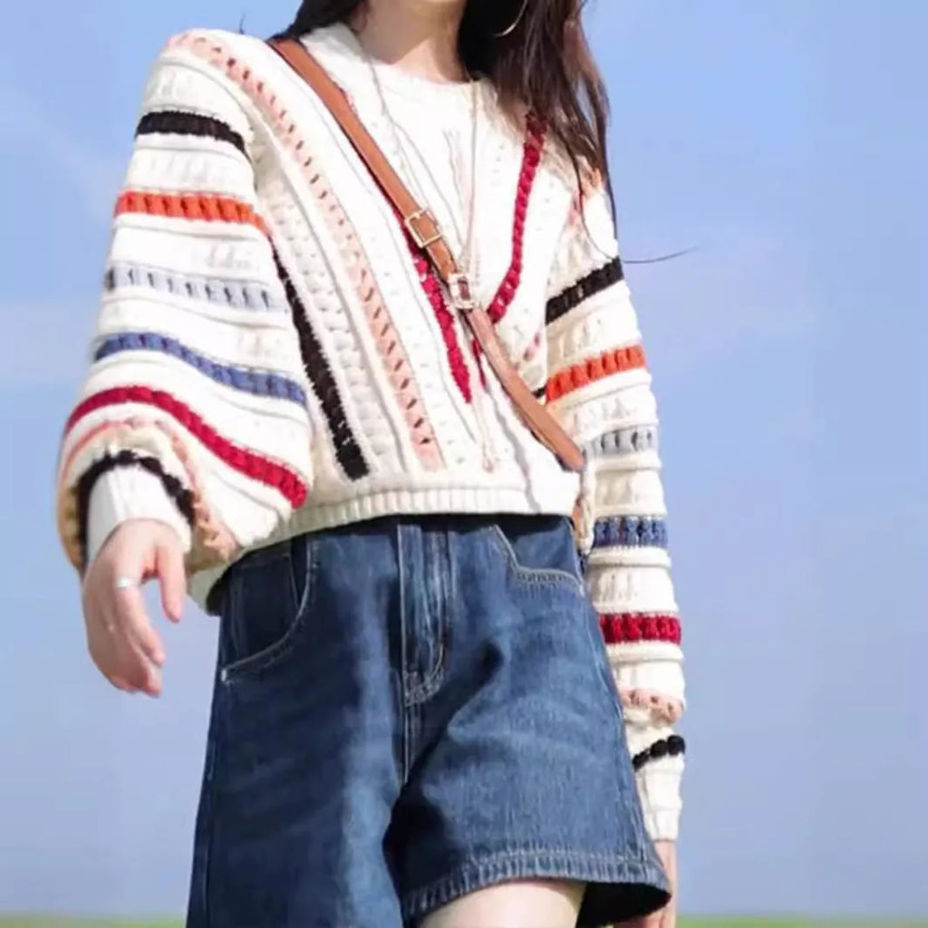 Colourful rainbow striped loose-fitting sweater with batwing sleeves and round neck