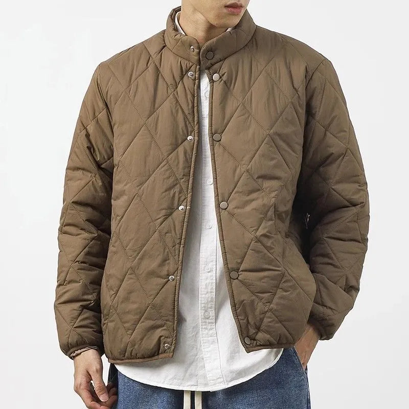 Men's black diamond lattice quilted winter jacket with a lengthened 100cm fit.