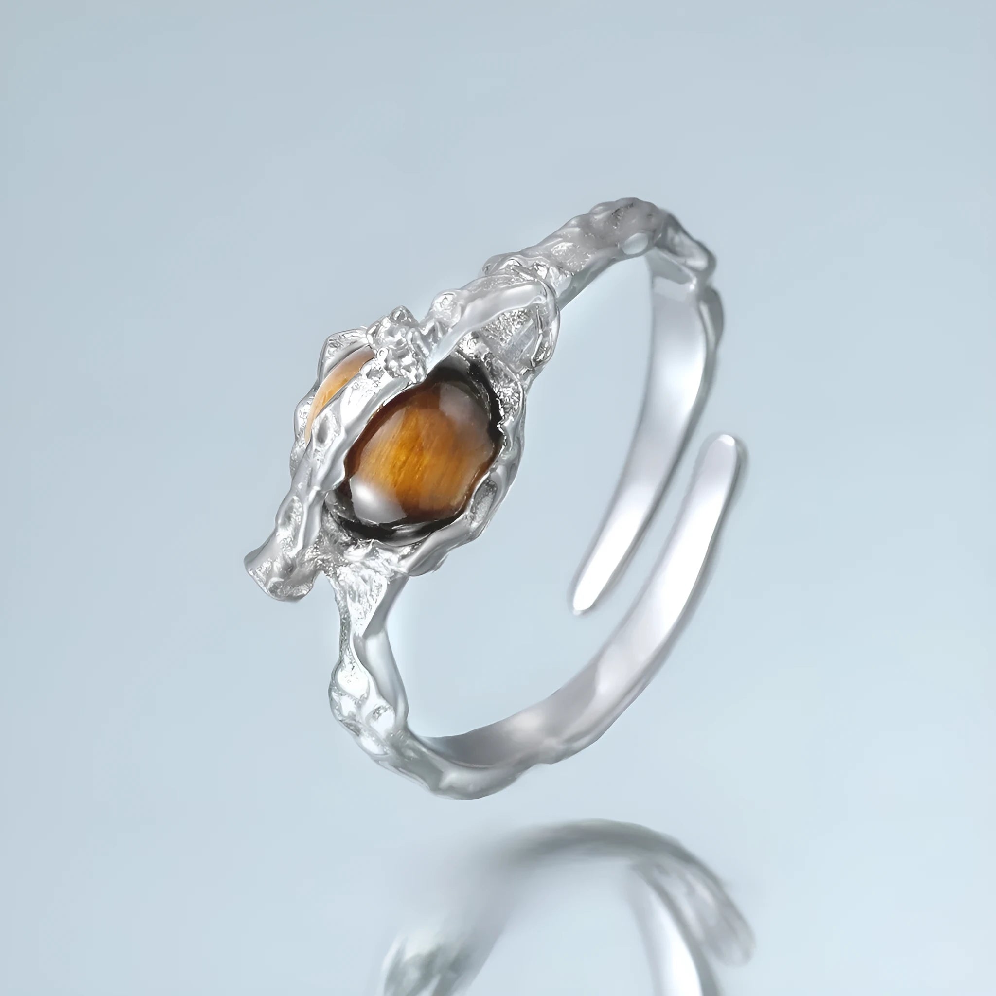 Women's adjustable silver ring with Saturn and Tigereye design in white gold electroplated finish