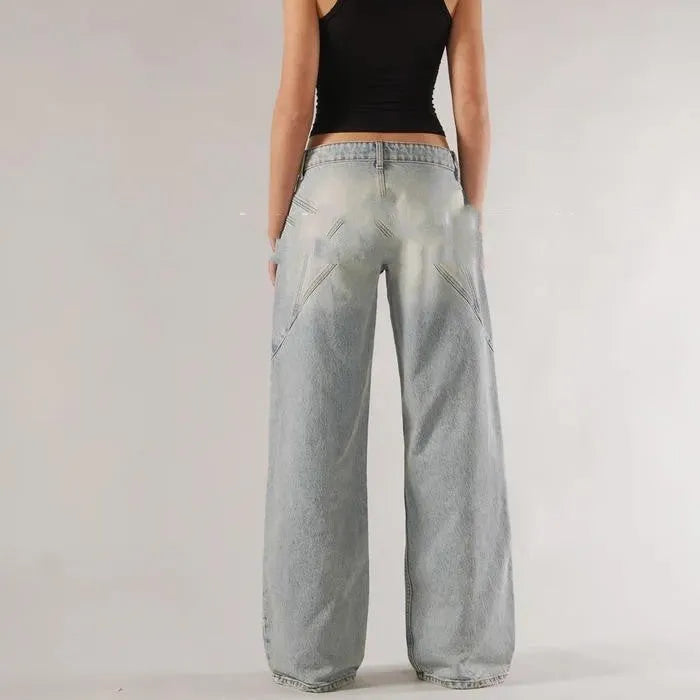 Women's loose straight wide leg cotton trousers in blue colour showing low-waist design and splicing detail
