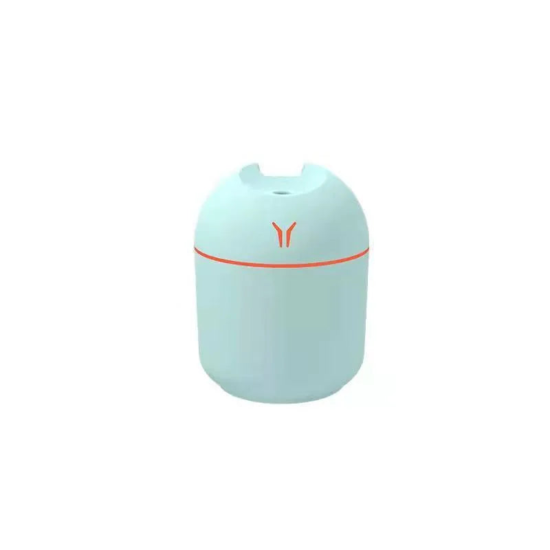 Round desktop humidifier in ivory white colour with USB cable and 250ml capacity marking