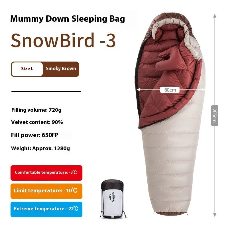 Goose down mummy style sleeping bag for adults with a storage bag.