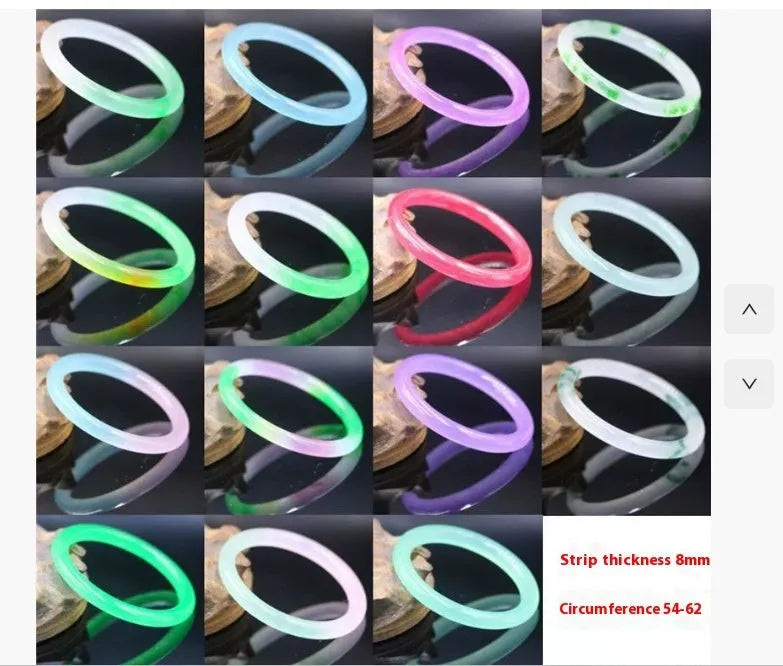 Jade bracelet with floating flower design and auspicious cloud patterns in ice-like emerald finish