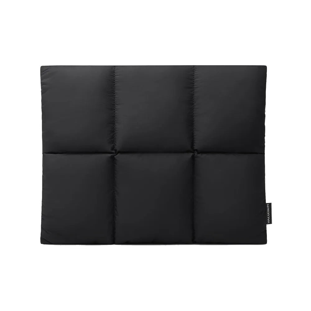 Soft black polyester laptop sleeve for a 13-15.6 inch laptop, showing fluffy texture and sewing thread detail.