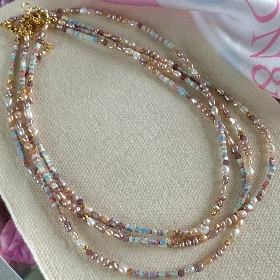 Purple freshwater pearl bracelet and necklace set with 14K gold-plated accents and irregular pearl shapes