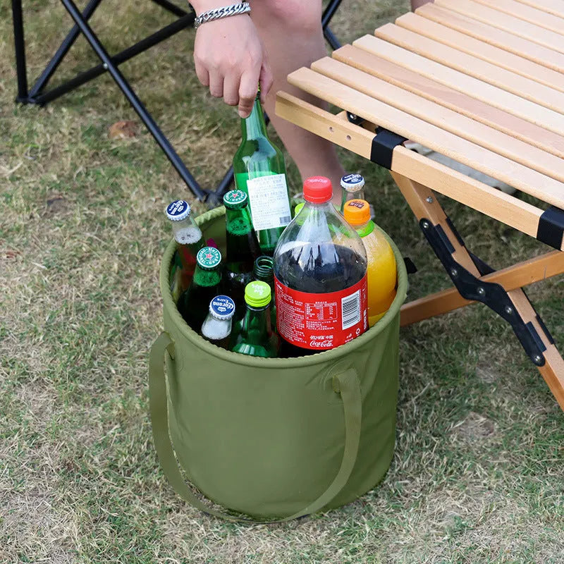 Army green folding telescopic storage duct with PVC mesh construction and ribbon handles