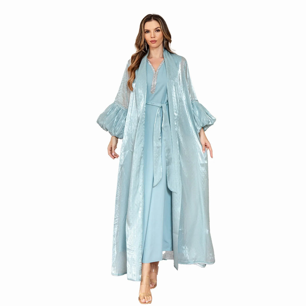 Arabic-style two-piece dress with rhinestone detailing and long sleeves in blue or brown colours