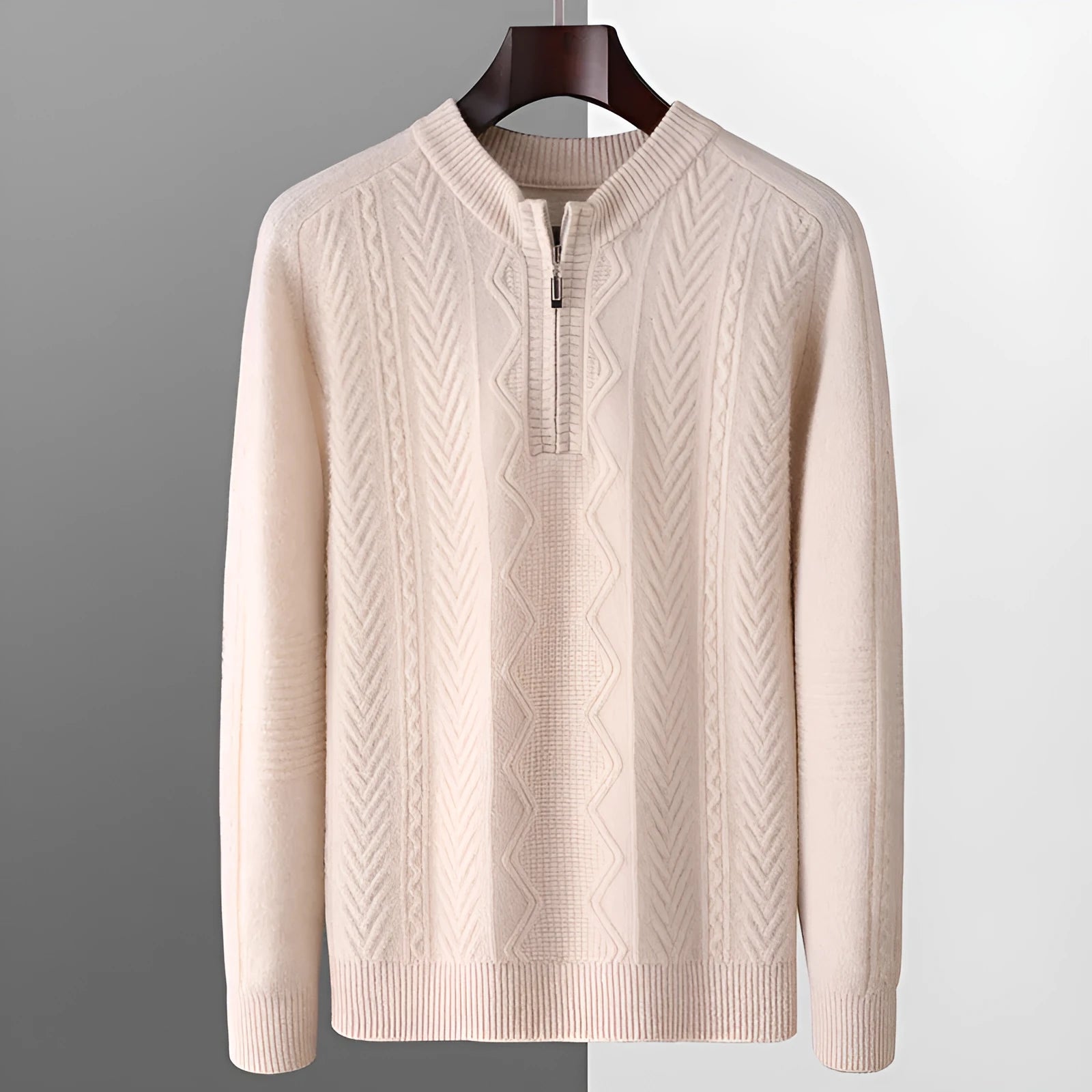 Man wearing a beige pure wool loose fit sweater with a diamond lattice pattern and a half-zip neck.