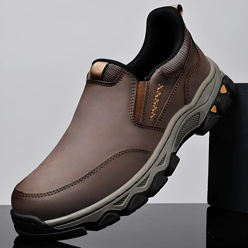 Men's dark brown casual leather-look shoes with round toe and flat rubber sole.