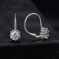 Sterling silver flower bud ear clips with white gold plating and 0.5ct moissanite stone