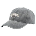 Adult personalised embroidered peaked cap in beige with adjustable strap and distressed lettering.