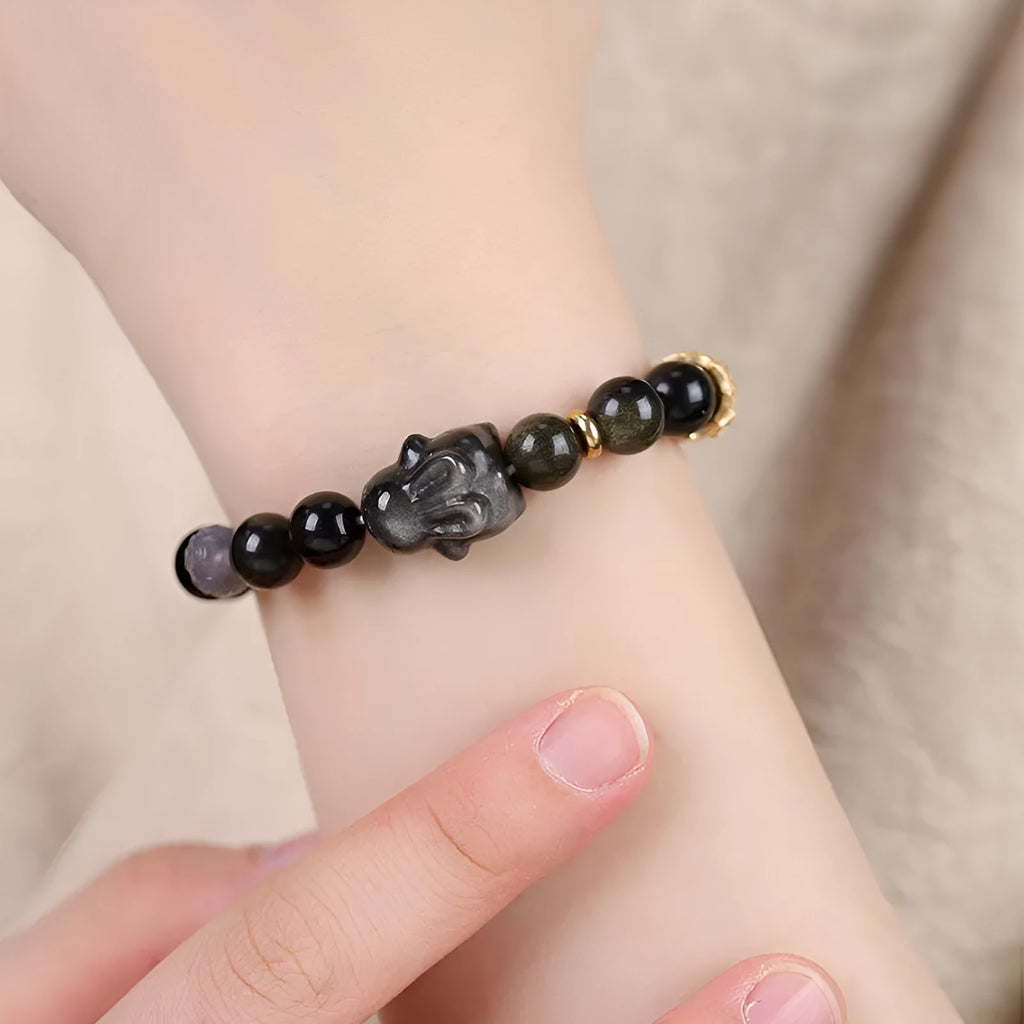 Handmade national style bracelet with lying rabbit charm made from jin yaoshi, agate, and brass.
