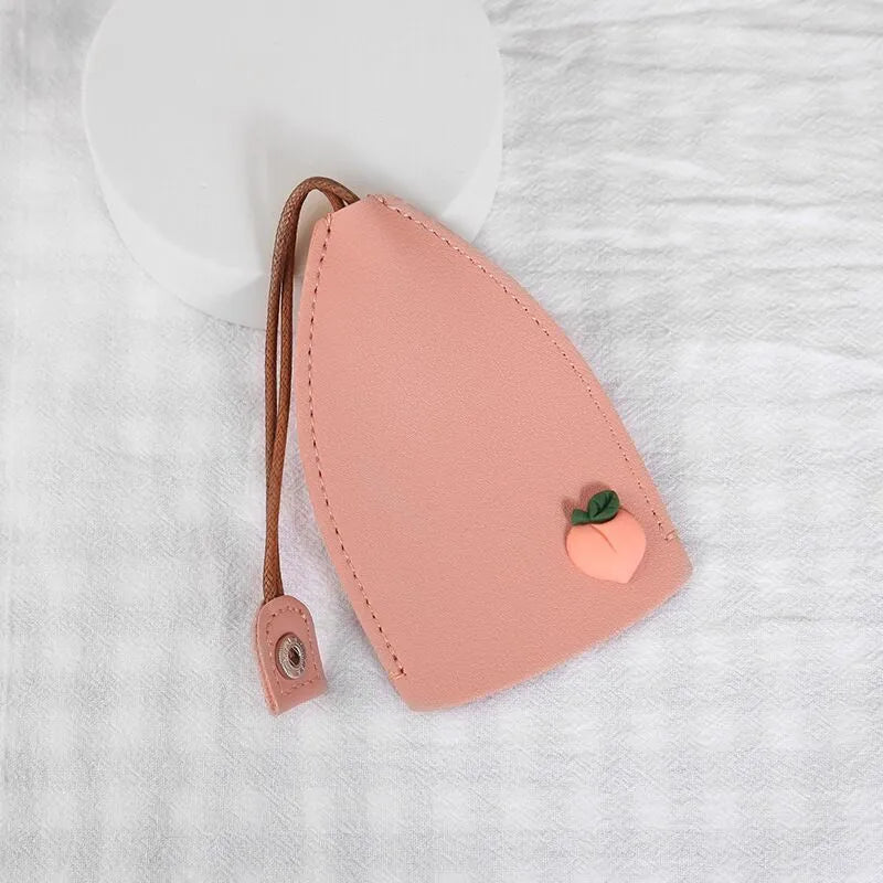Colourful cartoon pull-out key case for car keys with PU leather construction