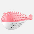 Blue silicone fish-shaped chew toy for cats on a plain background