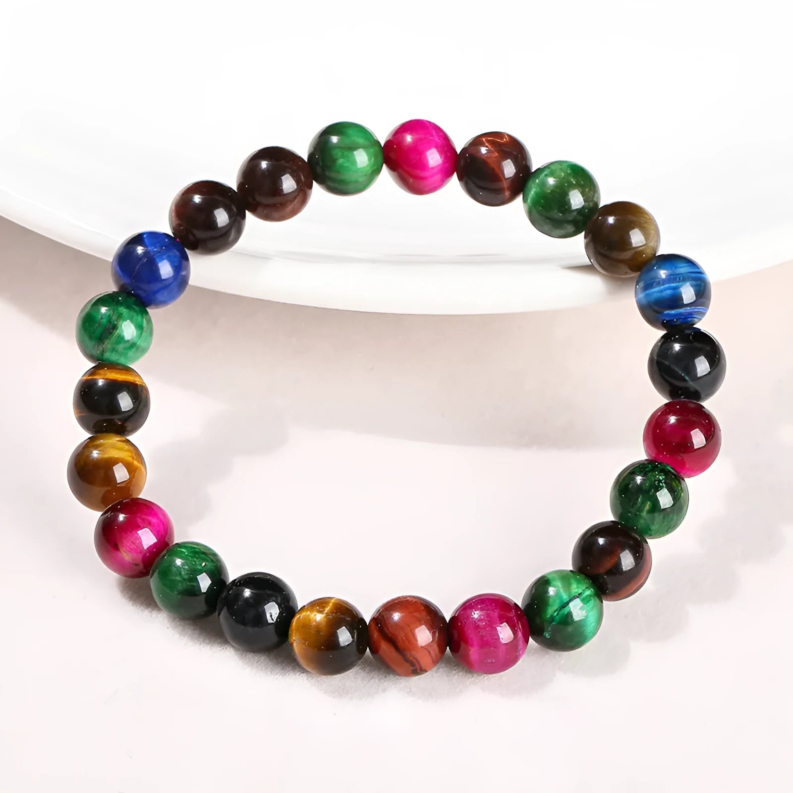Colourful Tiger Eye women's bracelet with round beads in 6mm, 8mm, 10mm, and 12mm sizes on a mixed string.