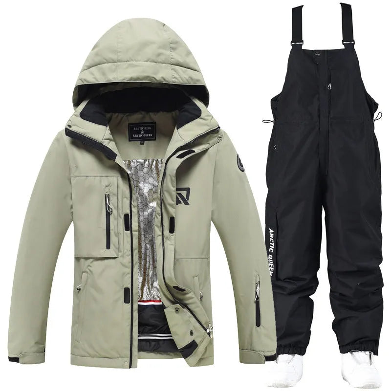 Men's and women's waterproof winter ski suit in blue top with grey blue trousers.