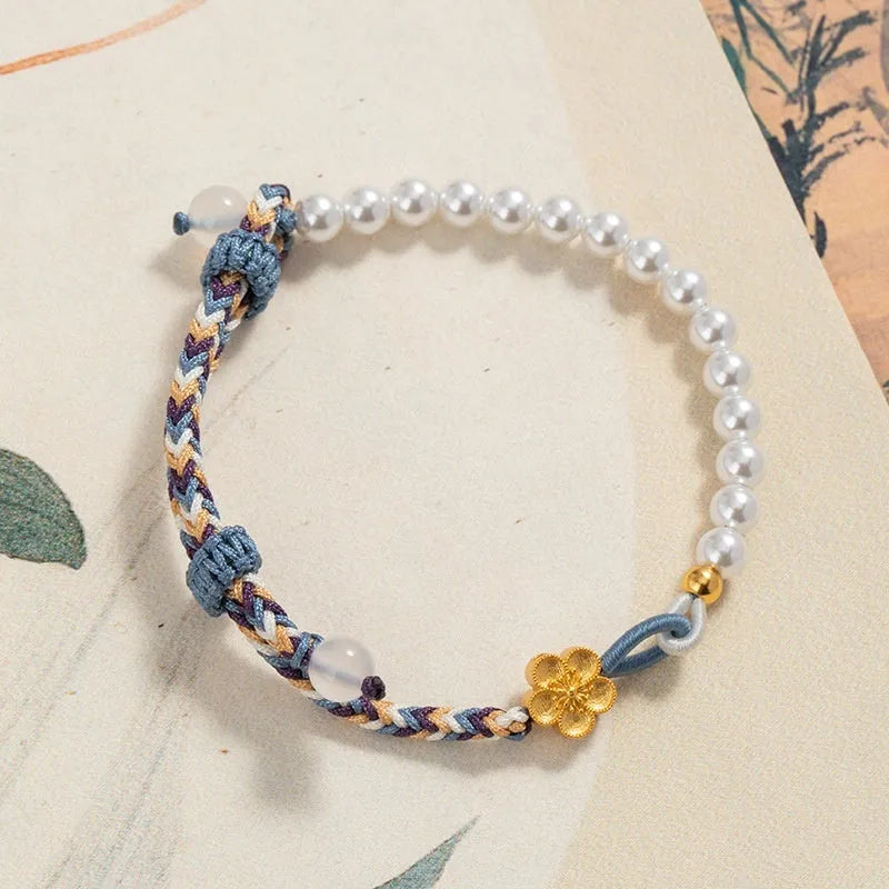 Peach coloured Chinese flower weaving carrying strap with sterling silver chalcedony and pearl decorations