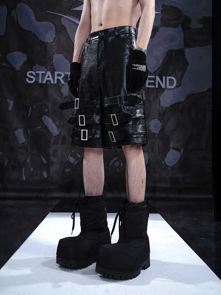 Men's black PU leather shorts with ring detailing, cropped casual design