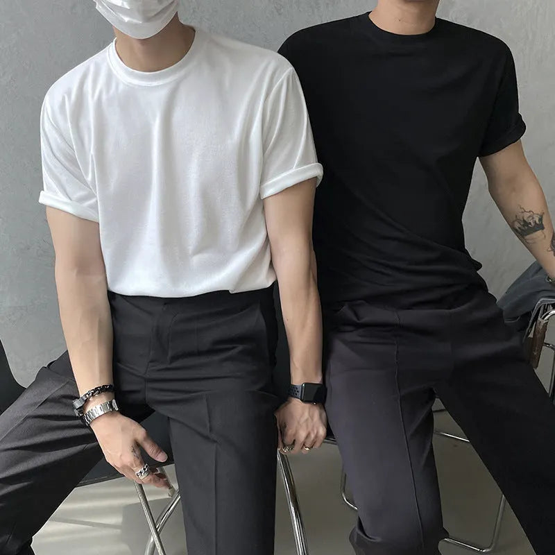 Men's slim fit cotton t-shirt in solid white colour showing round neck and half-length sleeves