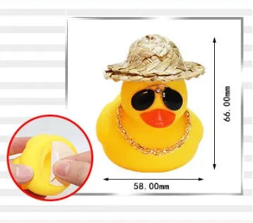 Straw hat yellow duck car dashboard ornament with removable sunglasses necklace on adhesive base.