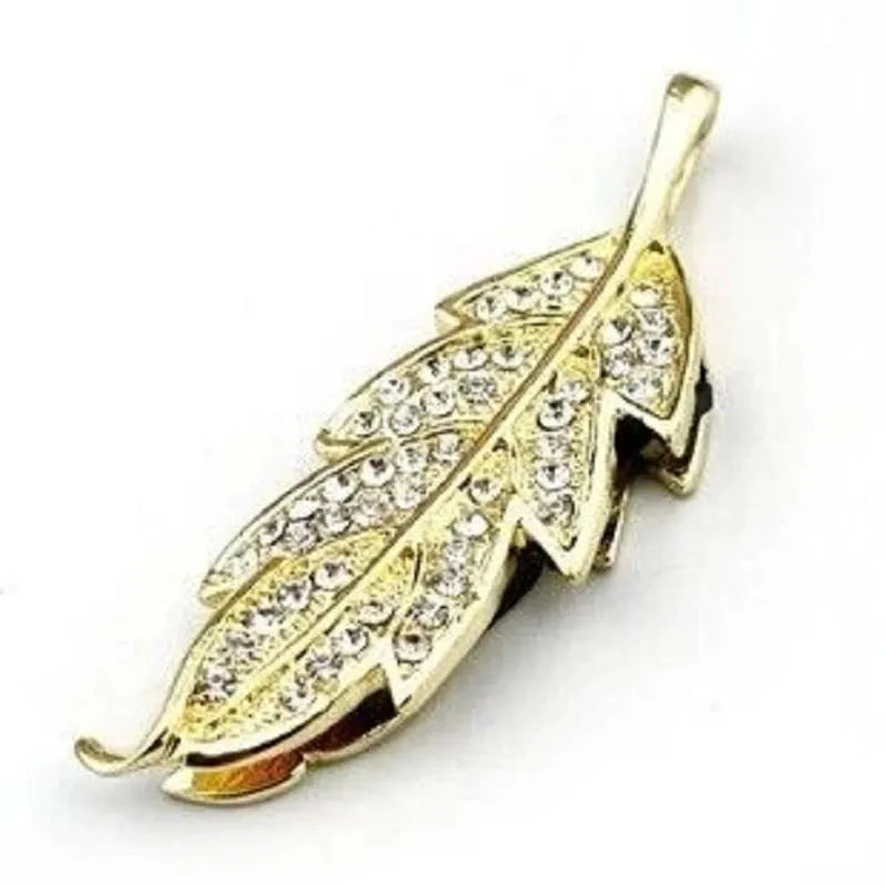Silver metal USB flash drive with a crystal leaf decoration showing front view and size.