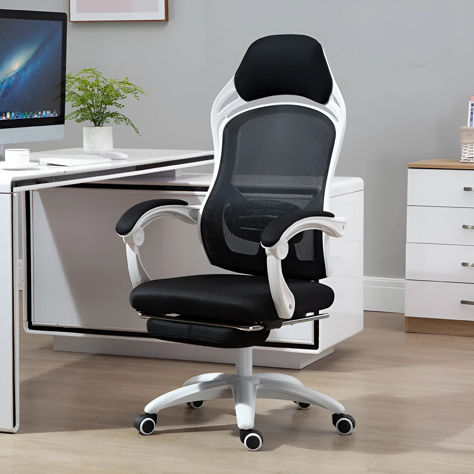 Rotating ergonomic computer gaming chair with black seat, nylon wheels, linkage armrests and footrest option