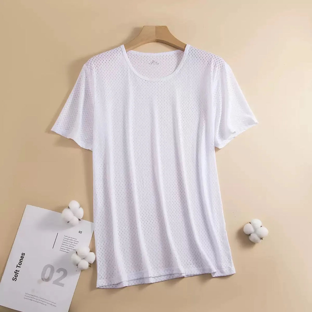 Man wearing a thin grey Ice Silk short sleeve crew neck t-shirt with a loose fit.